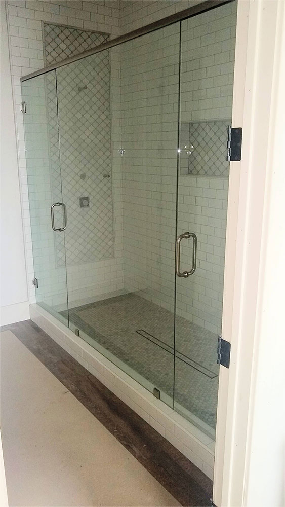 heavy glass door shower enclosure